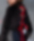 Zoom sur top noir en velours et son dos lacé avec un ruban rouge et des oeillets pour un look rock
