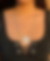 Photo porté du collier a pendentif palet carré argenté à double chaîne argentée upcyclée à partir de collier chinés à Emmaus fabriqué à Paris artisanalement